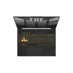 Top-down view of a black gaming laptop open, with orange backlit keys and a large screen above the keyboard.