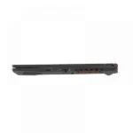 Side view of a closed black gaming laptop with orange rear ventilation, showing usb and hdmi ports along the edge.