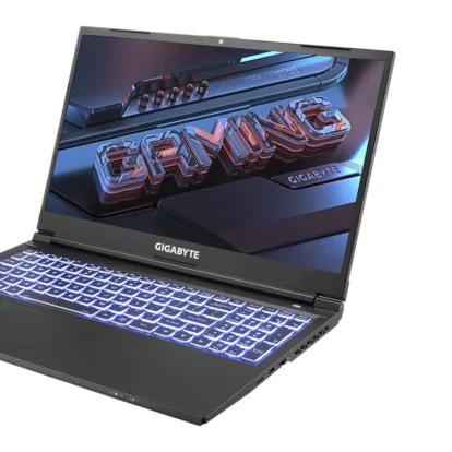 Open gaming laptop with backlit RGB keyboard and a vivid computer-themed screen showing the word 'GIGABYTE'