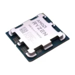 Amd ryzen processor mounted on a small circuit board, viewed at an angle.