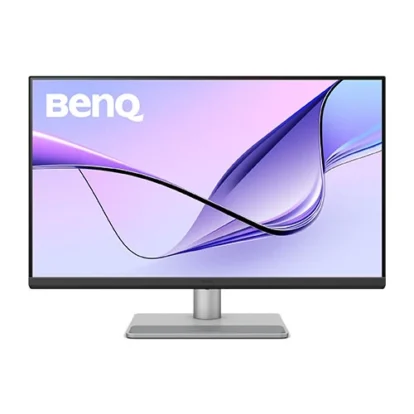 Benq widescreen monitor on a silver stand, displaying a purple-blue abstract wallpaper.