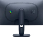 Rear view of a dark computer monitor on its stand, showing a dotted vent ring and a small rainbow color badge on the left.