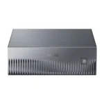 Asus compact desktop mini pc with a textured vented front panel and a power button on the right.