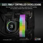 Inside a pc: rgb ram sticks, a circular cpu cooler showing 28°c, and a dark motherboard; ad for easy overclocking with icue.