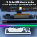 Desk setup with a white rgb keyboard, underglow lighting, a wooden speaker, and a monitor displaying rgb lighting software screenshots for customization of colors and effects (rgb setup).