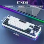 Compact 87-key white keyboard with rgb lighting, showing bluetooth, 2. 4ghz, and type-c connectivity; dimensions 14. 4in long, 5. 47in wide, 1. 61in tall.