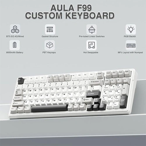 Aula f99 tri mode rgb mechanical gaming grey white keyboard with graywood switches Aula f99 custom keyboard on a light desk, highlighting wireless bt/2. 4g, gasket structure, hot-swappable switches, rgb backlight, 8000mah battery, pbt keycaps, and 96% layout with numpad.