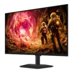 Curved computer monitor on a stand displaying two astronauts approaching a glowing portal in a fiery landscape.
