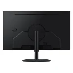 Back view of a black computer monitor mounted on a stand, showing the circular vesa mount area and ports on the rear.